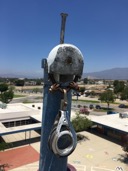 This is a trick fixed with some cable and a pully.  The Pully eventually grinds away at the cable and then causes a potential danger if it falls. 