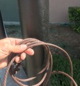This is a rope that has a bronze color to it so it will blend in with the newer style bronze poles.  