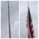 On left flagpole before the cleanser was applied.  Right was after
