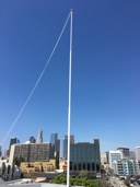 This is a rooftop flagpole restored to practicaly brand new with some paint and new parts at the top.  